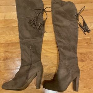 Public desire over the knee boots